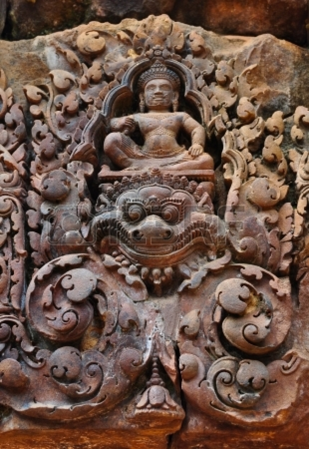 16428927-detail-of-beautiful-red-sandstone-reliefs-in-banteay-srei-temple-siem-reap--cambodia